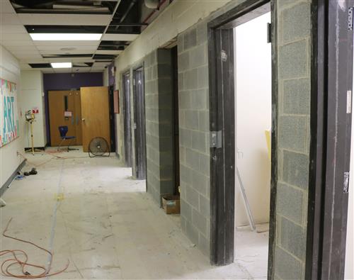 Hallway where bathrooms are being renovated 